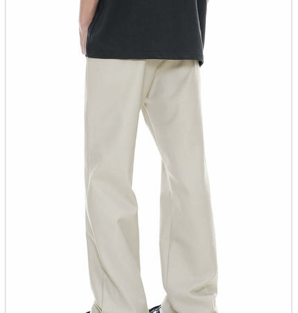 Classic Straight Pants – Slimming Fit worn by a person from behind, showcasing a modern straight-leg cut in a light color.