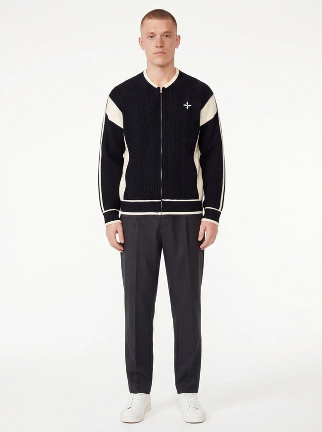 Model wearing Black color blocked patchwork baseball sweater by Grozavu