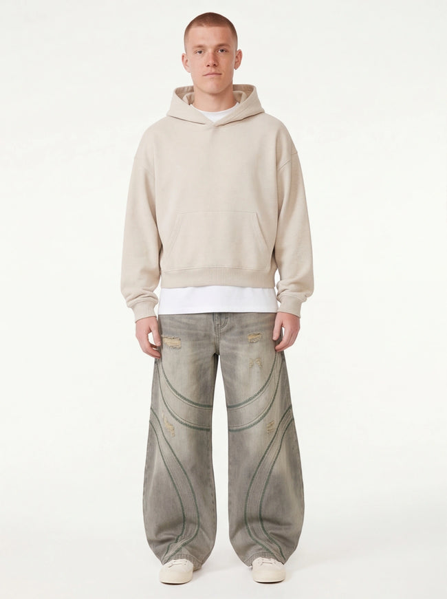Model wearing Gray deconstructed paneled arc embroidery distressed by Grozavu