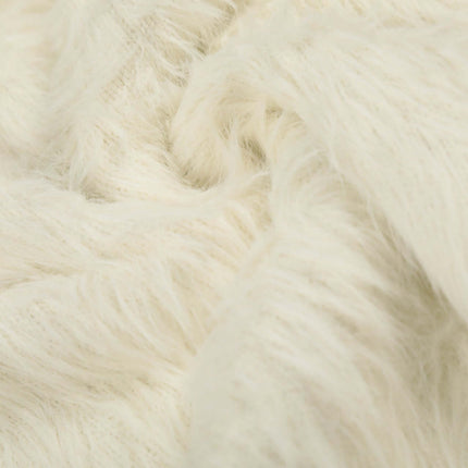 Close-up of soft white fabric texture, showcasing the cozy material used in the Fleece Letter Pullover Sweater – Loose Fit.