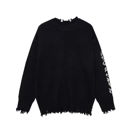 Back view of the Cross Jacquard Knit Sweater – Loose Fit showcasing its unique design and frayed hem.