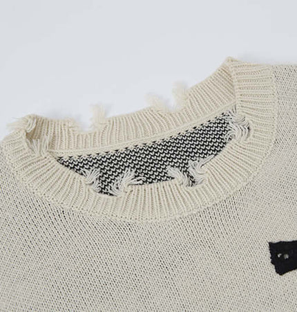 Cross Jacquard Knit Sweater – Loose Fit with distressed neck and cross jacquard pattern for bold street fashion.
