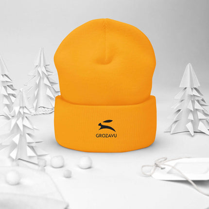 Cuffed Beanie in bright yellow with GROZAVU logo surrounded by white paper trees.