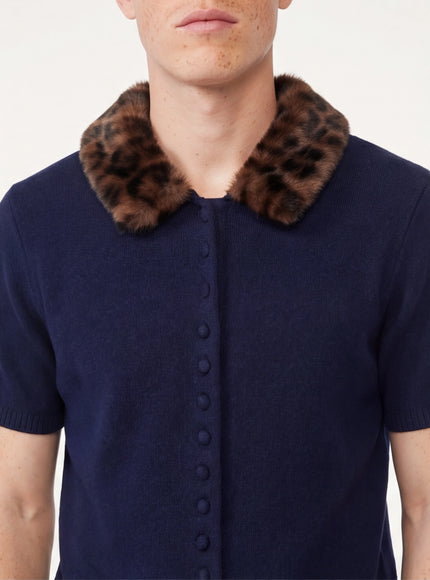 Close-up of Navy Blue animal print collar knitted jacket fabric