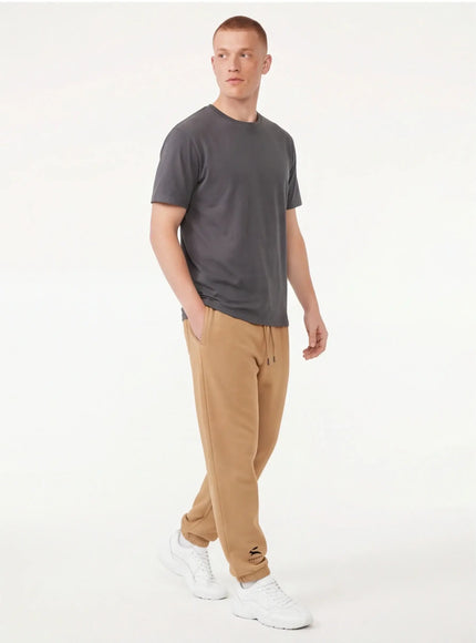 Model wearing urban sweatpants by Grozavu