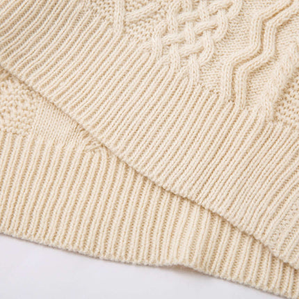 Close-up texture of the Diamond Pattern Jacquard Knit Sweater showcasing its intricate knit patterns and creamy color.