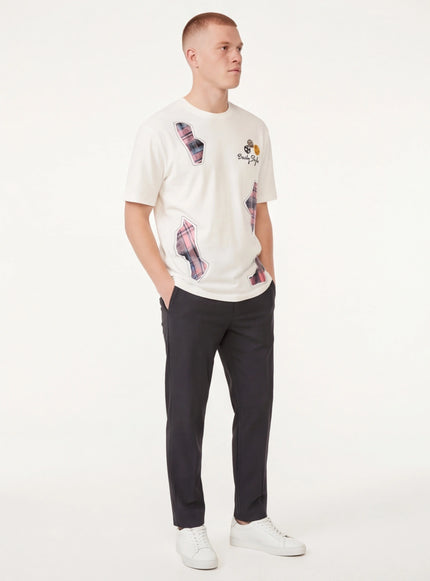 Back view of Black applique badge graphic tee by Grozavu