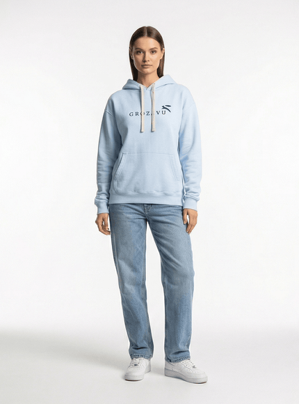 Model wearing washed oversized hoodie by Grozavu