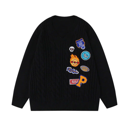 Maglione a V in maglia cable ricamato