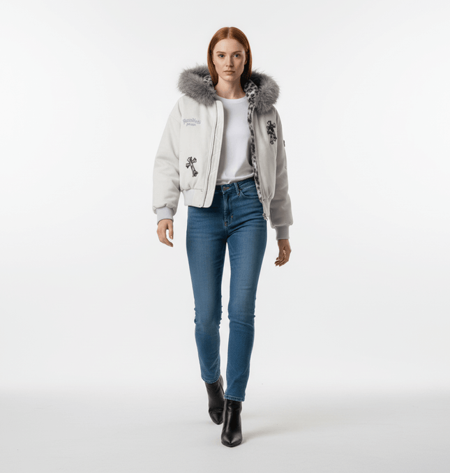 Embroidered Hooded Coat – Loose Fit worn by a model, featuring a cozy fur collar and relaxed silhouette.