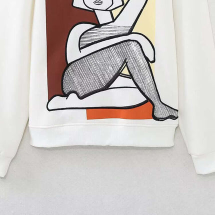 Embroidered Pattern Hoodie – Loose Fit featuring artistic design and soft street style details.