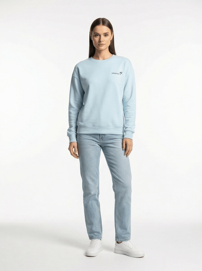 Model wearing structured drop-shoulder sweatshirt by Grozavu