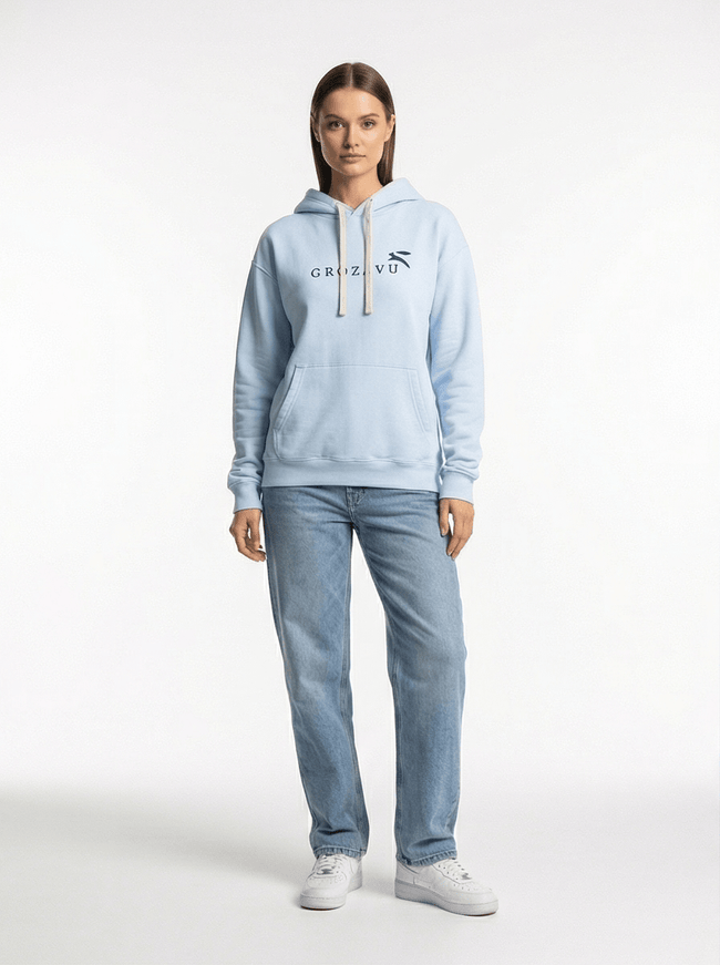 Model wearing washed oversized hoodie by Grozavu