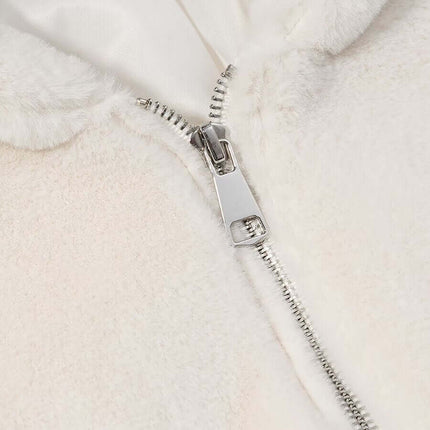 Close-up of the zipper on a cozy Faux Fur Hooded Winter Coat for Women, showcasing its soft fabric and stylish detail.