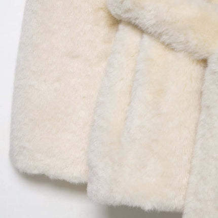 Close-up view of the faux fur texture on the Faux Fur Waistcoat Jacket – Slim Fit in classic white color.