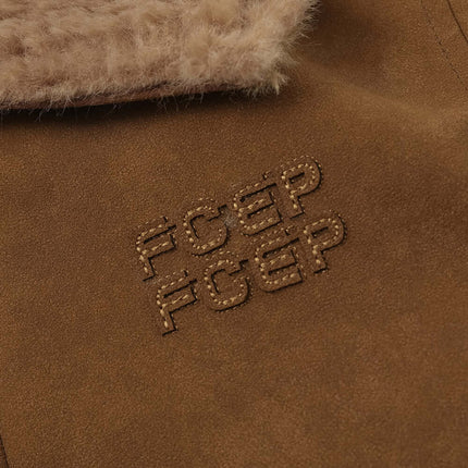 Close-up of the Faux Suede Fur Collar Jacket – Loose Fit showing plush fur collar and stylish appliqué design.