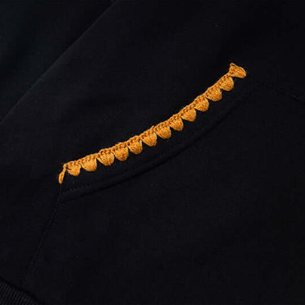 Fleece Lined Leopard Ears Hoodie detail showing pocket with unique crochet design and playful leopard print