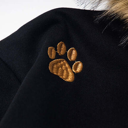 Fleece Lined Leopard Ears Hoodie featuring a playful gold paw print detail on the sleeve for added charm.