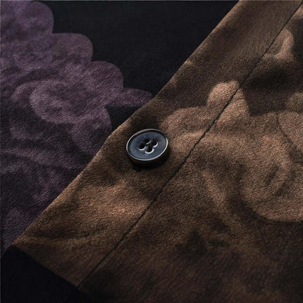 Close-up of the button and fabric detail on the Floral Short Sleeve Shirt – Loose Fit.
