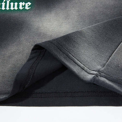 Close-up of the sleeve hem detail of the Graffiti Butterfly Print Tank Top - Loose Fit showcasing fabric quality.