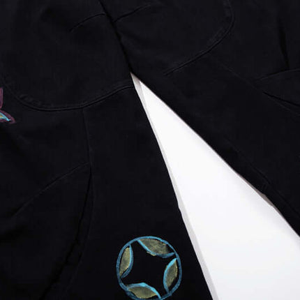 Graffiti Printed Cargo Denim Pants featuring hand-painted flower graffiti artwork and a stylish dark wash.