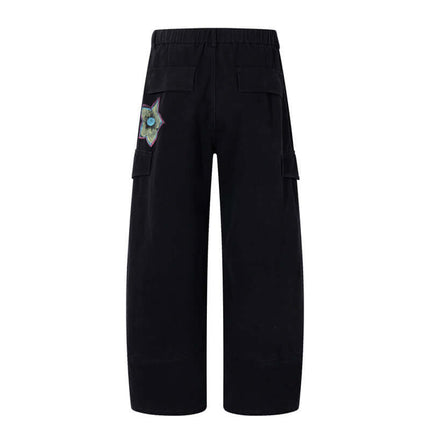 Pantalons en denim cargo imprimés graffiti