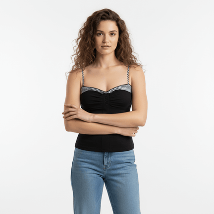 Grid-Stitched Strapless Tank Top – Slim Fit modeled by a woman, showcasing contemporary fashion and a flattering silhouette.