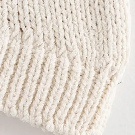 Close-up of the stitching texture of the Asymmetrical Chain Knit Tank Top – Slim Fit in soft knitted fabric.