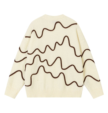 Back view of Color Block Line Knit Sweater – Loose Fit featuring wavy brown line design on cream fabric.