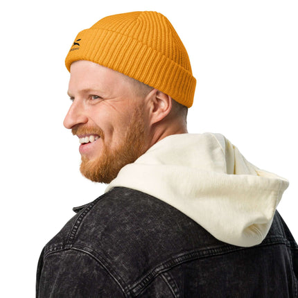 Man wearing a Grozavu beanie, showcasing the cozy and trendy fisherman-style design.
