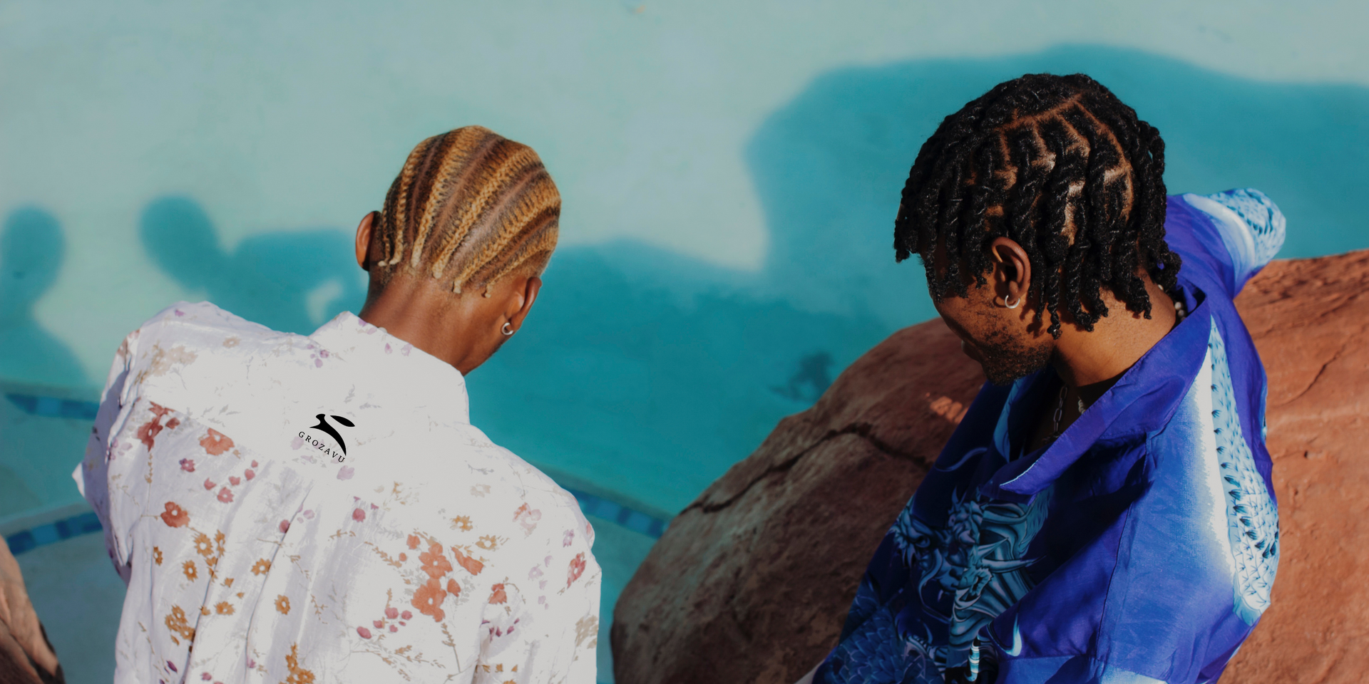Grozavu men’s button-up shirts by the pool—white floral with rabbit logo and blue dragon print—summer streetwear lifestyle
