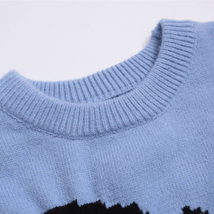 Close-up of the collar of the Retro Cartoon Jacquard Hoodie - Loose Fit showcasing soft acrylic fabric texture.