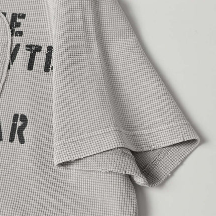 Close-up of the Retro Waffle Washed Cotton TShirt showing textured fabric and relaxed fit.