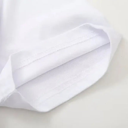 Close-up view of the sleeve detail of a Cotton TShirt with Oil Painting Print in white.