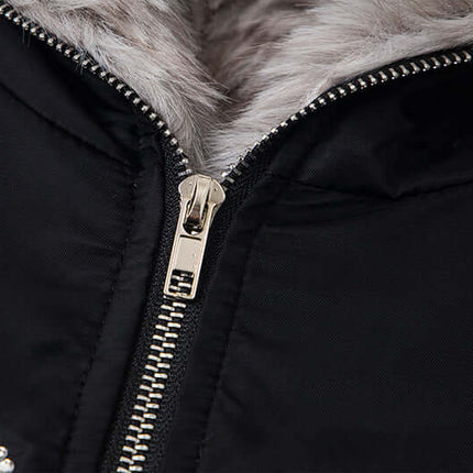 Close-up of the zipper and faux fur lining of the Hawk Embroidered Letter Hooded Coat.