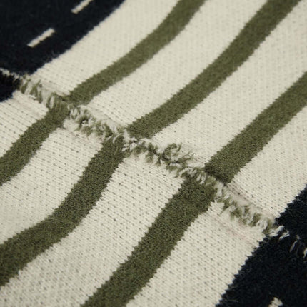 Texture detail of High Neck Stripe Jacquard Cardigan showcasing the jacquard knit design and cozy fabric.