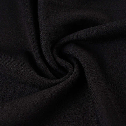 Fabric detail of the Low-Waist Flared Leggings – Slim Fit, showcasing high-quality twill polyester in black.