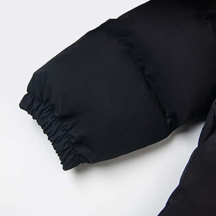 Detail of the sleeve of the Hooded Cotton Puffer Coat – Loose Fit with elastic cuff design.