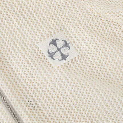 Hooded Embroidered Knit Cardigan fabric detail showcasing delicate embroidery and soft texture.