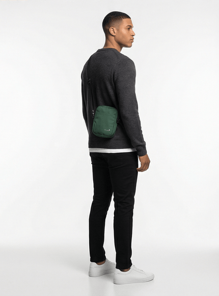 Model wearing utility crossbody bag by Grozavu