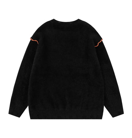 Back view of Knit Sweater with Letter Applique, featuring a relaxed fit and unique hand-stitched detail.