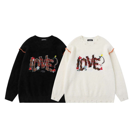 Knit Sweater with Letter Applique in black and white featuring handcrafted embroidery and a relaxed fit.