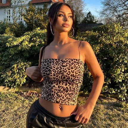 Leopard Print Strapless Crop Tank Top worn by a confident woman outdoors, showcasing bold summer fashion.