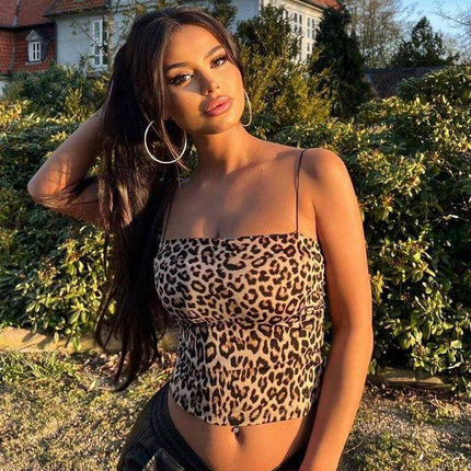 Leopard Print Strapless Crop Tank Top worn by a confident woman in natural outdoor setting.