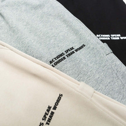 Letter Print Casual Pants – Loose Fit showcasing three color options with modern letter print design.