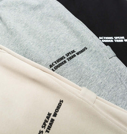 Letter Print Casual Pants – Loose Fit showcasing three color options with modern letter print design.