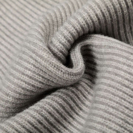 Close-up of soft fabric showing the texture of the Retro Cardigan Sweater - Loose Fit.