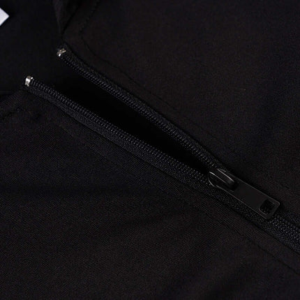 Close-up view of the zipper on the Long Sleeve Devil Hooded VNeck TShirt, showcasing its sleek black fabric and design.