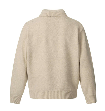 Back view of Loose Buttoned Turn Down Collar Sweater in soft beige, showcasing its relaxed fit and stylish collar.