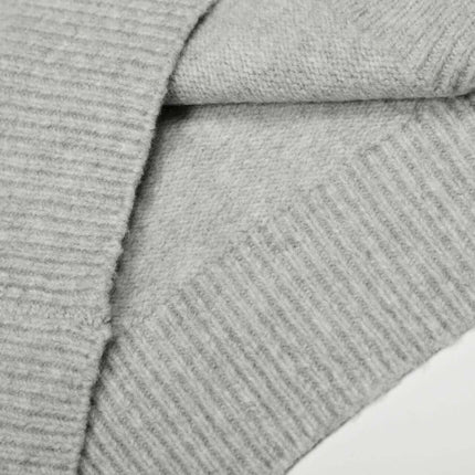 Loose Buttoned Turn Down Collar Sweater fabric detail showing soft polyester knit and comfortable texture.